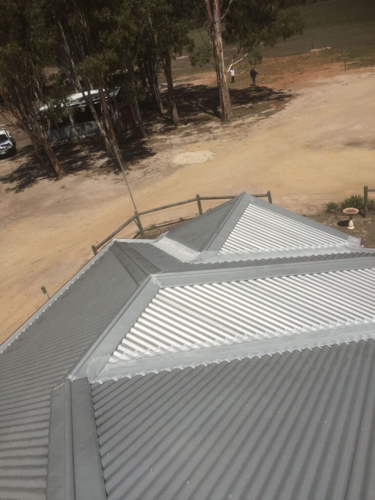 Completed valley and gutter installation of powdered coated aluminium on a corru...