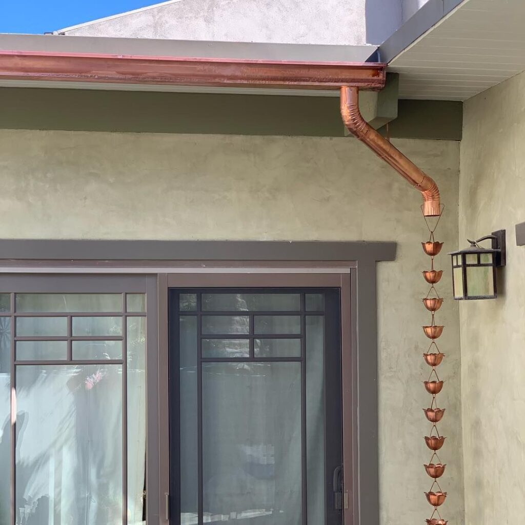 Nevada Silva on Instagram: “Just completed a custom copper rain chain and gutter installation! Rain barrel to come next ♻️💧🌿 #nevadasilva #lagunabeach #homedesign…”
